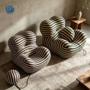 Striped lounge chairs with rounded seats and matching ottomans