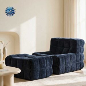 Dark blue tufted lounge chair with a matching ottoman - D-611