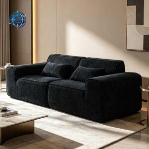 Black upholstered sofa with wide arms and loose back cushions - Y-612